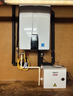 Tankless Water Heater Install - This install was done in Bellevue WA with new gas lines, cpvc drainage and new backup battery for power outages.
