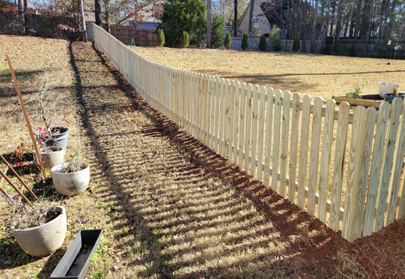 Custom Built Wood Fence - A new, custom build fence installation by Moore's Fencing! Keep the chilly winds at bay and maintain your privacy with a sturdy fence. Enhance your property's security and protect your loved ones and belongings. Give your furry friends a safe space to enjoy the crisp autumn air. Let's discuss how we can elevate your home with our quality fencing solutions! Give us a call to schedule your free, no hassle estimate at 706-575-4262