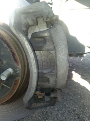 Brake and Caliper Repair - Customers brakes grinded down and fell out and the caliper locked. I unlocked caliper and replaced the brakes and rotor. Customer was very satisfied. Brake and Caliper Repair - Customers brakes grinded down and fell out and the caliper locked. I unlocked caliper and replaced the brakes and rotor. Customer was very satisfied.