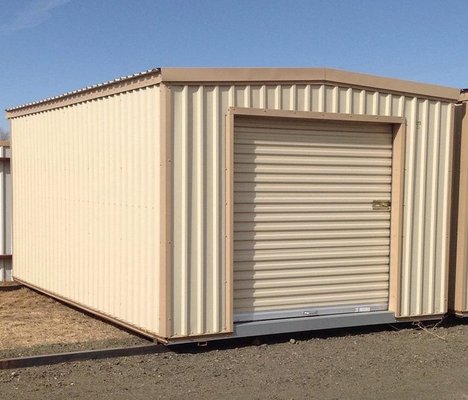10'x16.5 Storage Unit (165 sq.ft.) - The 10' x 16.5' Storage Unit can fit the contents of three full bedrooms. Items such as mattress sets, sofas, chests of drawers, bookcases, and desks.
These attractive steel storage buildings are built to last with welded framing consisting of 14 gauge structural steel, and 26 gauge metal siding/roof with a 40-year silicone polyester paint. The 6' x 6' roll-up steel door and bezel lock provide easy accessibility and security.
You can rent one of these storage units in our yard or yours. Give us a call today at 256-273-0836. 10'x16.5 Storage Unit (165 sq.ft.) - The 10' x 16.5' Storage Unit can fit the contents of three full bedrooms. Items such as mattress sets, sofas, chests of drawers, bookcases, and desks.
These attractive steel storage buildings are built to last with welded framing consisting of 14 gauge structural steel, and 26 gauge metal siding/roof with a 40-year silicone polyester paint. The 6' x 6' roll-up steel door and bezel lock provide easy accessibility and security.
You can rent one of these storage units in our yard or yours. Give us a call today at 256-273-0836.