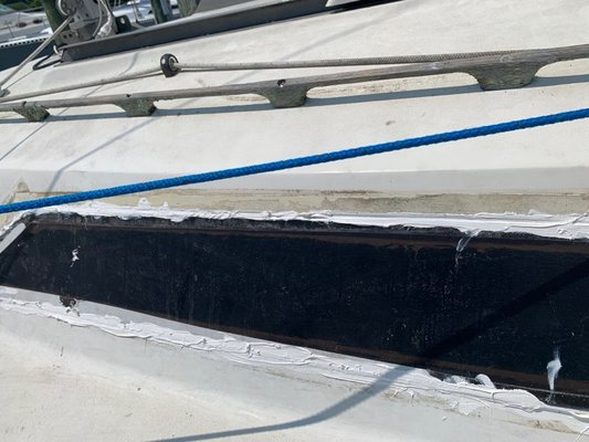 Sail Boat with leaks caulked by Owners - This owner was having massive leaking issues from old lenses that they just kept caulking. They decided to go for the Full on-site service. We went to the boat, removed the old lenses & cleaned and prepped the boat. We went back to the shop and templated the old lenses to make new lenses and then went back to the boat for the install. Sail Boat with leaks caulked by Owners - This owner was having massive leaking issues from old lenses that they just kept caulking. They decided to go for the Full on-site service. We went to the boat, removed the old lenses & cleaned and prepped the boat. We went back to the shop and templated the old lenses to make new lenses and then went back to the boat for the install.