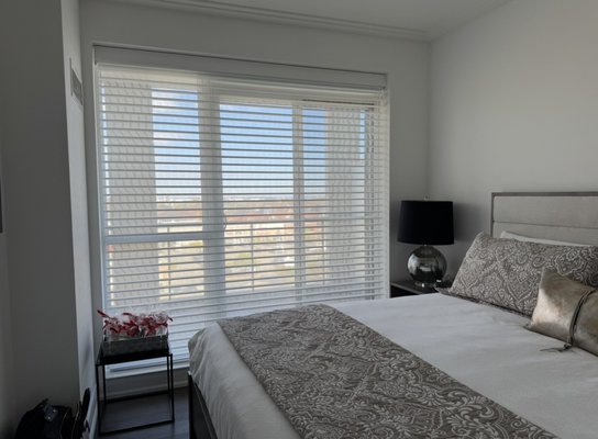 Condo Remodel - * Removed the existing outdated vertical blinds found throughout the unit, which obstructed views and diminished the suite's luxurious potential.
* Designed and installed custom Sunset shades (also known as transition, zebra, or layered shades) to replace the dated vertical blinds.
* Engineered the new window treatments to maximize the suite's views while offering flexible light control and privacy.
* Enhanced the condo's ambiance by installing shades that softly filter harsh natural light, providing a warm and inviting atmosphere.
* Improved energy efficiency and protection by utilizing shades that block damaging UV rays, safeguarding interior furnishings and flooring from sun damage. Condo Remodel - * Removed the existing outdated vertical blinds found throughout the unit, which obstructed views and diminished the suite's luxurious potential.
* Designed and installed custom Sunset shades (also known as transition, zebra, or layered shades) to replace the dated vertical blinds.
* Engineered the new window treatments to maximize the suite's views while offering flexible light control and privacy.
* Enhanced the condo's ambiance by installing shades that softly filter harsh natural light, providing a warm and inviting atmosphere.
* Improved energy efficiency and protection by utilizing shades that block damaging UV rays, safeguarding interior furnishings and flooring from sun damage.