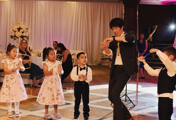 Magic Tiger your kids party magician - Do you need a baby sitter, a simple tricks presenter, a guy who can do jokes for the little ones?
No no, Eric, the magic tiger is not that dude.
Magic tiger is FUN, ENGAGING, FASHION and of course MAGICIAL!
The kids love him, the parents are talking about him.
Magic Tiger's magic show includes 45 minutes magic show and about 15 minutes balloon twisting.
The magic show is family friendly for any age group. 
The tricks are not only for kids but for parents as well. Grown ups are welcome to join the show.
Of course, I'll do little cute balloon twisting for kids. There'll be balloon flowers, swords, cute animals such as dogs, bunnies, butterflies, dinosaurs and so on...
There will be solo shows with music, interacting routines, full of audiences participation, lots of fun, lots of surprise.
Please feel free to ask any question about the magic show.
You may know more from my website: 
https://www.magicericq.com

Here's what I usually do for magic show: 
three parts: 
A. warming up. 
B. Miracles. 
C. You are the magician 
Magic list: 
1. Little red ball warm up
2. Make a wave
3. Red & White sole routine   
4. My first trick story
5. Rope rope
6. Magic dance battle
7. Make a dog
8. Magic dog
9. Brave trick
10. Game time
  
The time is 45min pure magic show with over 20 tricks/effects during the show. It might change a little bit depends on live situation. Lots of fun and surprise, everyone will have a great time.