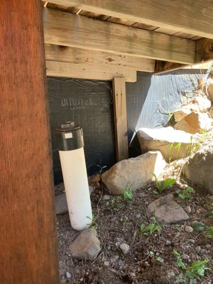 Deck settling - Owner called to ask why her deck was pulling away from the wall and settling.  Discovered incorrect original support methods.  jacked stair landing against house and installed proper support band.  Jacked cracked outside band joist and sistered support 2"x10" to cracked joist.  Main front two story 4" x 4" post set in dirt-no concrete footing.  Dug out under post and set form to freeze depth (40") and filled with readi-mix concrete,  Anchored bottom of two support posts that had moved from being square & plumb