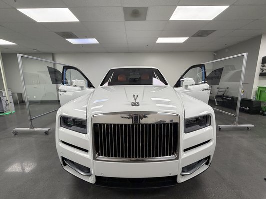 Rolls-Royce Cullinan PPF, Windshield Tint & Ceramic Window Tint - Ceramic Garage Lathrop - Rolls-Royce Cullinan PPF, Windshield Tint & Ceramic Window Tint | Ceramic Garage Lathrop
This stunning Rolls-Royce Cullinan came to Ceramic Garage in Lathrop for a complete luxury protection package featuring Paint Protection Film (PPF), windshield tint, and ceramic window tint. As one of the most prestigious SUVs on the road, the Cullinan deserves the highest level of care—and our team delivered premium protection that preserves both its beauty and value.
To safeguard the Cullinan’s flawless paintwork, we installed high-performance, self-healing PPF on key impact areas, including the front bumper, hood, fenders, mirrors, door edges, and headlights. This invisible protective layer shields the vehicle from rock chips, scratches, bug splatter, and road debris, all while maintaining the factory finish and showroom appearance.
For interior comfort and UV protection, we applied advanced ceramic windshield tint to reduce glare, heat, and harmful UV rays without affecting visibility or the Cullinan’s driver-assist cameras and sensors. This upgrade keeps the cabin cooler, protects the dashboard and leather from fading, and makes driving more comfortable in California’s bright sun.
We also completed the package with premium ceramic window tint on all side and rear glass. This provides up to 99% UV protection, superior heat rejection, and enhanced privacy while preserving the elegant look of this luxury SUV. The non-metallic ceramic film is completely safe for GPS, Bluetooth, and wireless systems.
At Ceramic Garage Lathrop, we specialize in ultra-luxury and high-end vehicles, offering expert installation of PPF, ceramic window tint, and windshield tint for clients in Lathrop, Modesto, Manteca, and Tracy. If you’re looking to protect and preserve your Rolls-Royce Cullinan or any luxury vehicle, our team delivers unmatched quality and attention to detail. Rolls-Royce Cullinan PPF, Windshield Tint & Ceramic Window Tint - Ceramic Garage Lathrop - Rolls-Royce Cullinan PPF, Windshield Tint & Ceramic Window Tint | Ceramic Garage Lathrop
This stunning Rolls-Royce Cullinan came to Ceramic Garage in Lathrop for a complete luxury protection package featuring Paint Protection Film (PPF), windshield tint, and ceramic window tint. As one of the most prestigious SUVs on the road, the Cullinan deserves the highest level of care—and our team delivered premium protection that preserves both its beauty and value.
To safeguard the Cullinan’s flawless paintwork, we installed high-performance, self-healing PPF on key impact areas, including the front bumper, hood, fenders, mirrors, door edges, and headlights. This invisible protective layer shields the vehicle from rock chips, scratches, bug splatter, and road debris, all while maintaining the factory finish and showroom appearance.
For interior comfort and UV protection, we applied advanced ceramic windshield tint to reduce glare, heat, and harmful UV rays without affecting visibility or the Cullinan’s driver-assist cameras and sensors. This upgrade keeps the cabin cooler, protects the dashboard and leather from fading, and makes driving more comfortable in California’s bright sun.
We also completed the package with premium ceramic window tint on all side and rear glass. This provides up to 99% UV protection, superior heat rejection, and enhanced privacy while preserving the elegant look of this luxury SUV. The non-metallic ceramic film is completely safe for GPS, Bluetooth, and wireless systems.
At Ceramic Garage Lathrop, we specialize in ultra-luxury and high-end vehicles, offering expert installation of PPF, ceramic window tint, and windshield tint for clients in Lathrop, Modesto, Manteca, and Tracy. If you’re looking to protect and preserve your Rolls-Royce Cullinan or any luxury vehicle, our team delivers unmatched quality and attention to detail.