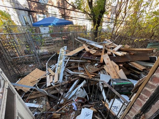 Construction debris - This was a construction debris cleanup, the customer converted a single family to a multi and the contractor put all the debris in the back yard. Needles to say we completed the job.