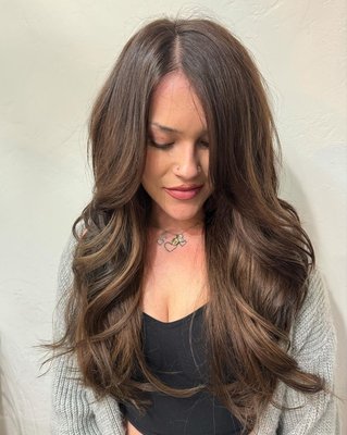 Transform Your Look! - Transforming your look with hair extensions is a quick and versatile way to add length, volume, or a pop of color to your hair. Extensions allow you to experiment with different styles without making permanent changes. They can create dramatic length, fuller hair, or enhance your natural texture, giving you a fresh, polished, or glamorous appearance in an instant. Call or Book Online today!