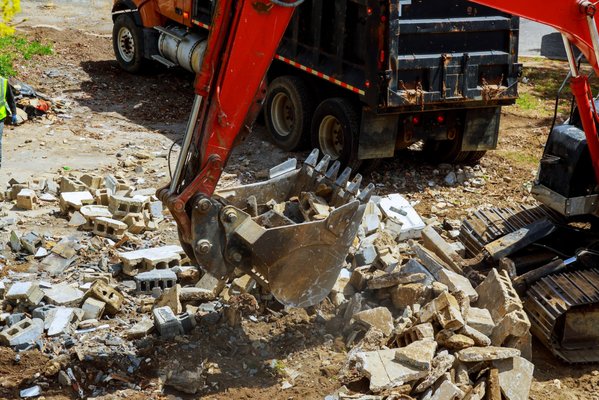 Demolition Details - Clean Demolition

When light demolition is called for, Dirthog Excavation can meet your needs. We help relieve our clients’ responsibilities by supervising as many aspects of the project as we can.

As professional excavators, we take pride in leaving the demolished site ready for the new construction to begin, or lawn ready. Where many demolition contractors fall short in post-demolition cleanup, Dirthog uses it’s experience and expertise to ensure that all cavities are compacted to engineered specs and ready for your next project.

Comprehensive Demolition Services

Precise and cost-effective demolition solutions from a true professional
There’s more to demolition than just tearing down a structure and clearing the debris. At Dirthog Excavation, we’ll first inspect the site to be demolished and look for any potential problem areas, such as existing utility infrastructure or live electrical wires. We’ll take care of every detail to ensure your Alaskan demolition goes as smoothly as possible.

In many cases, our clients want to preserve materials for other purposes. Dirthog Excavation is fully capable of separating reusable bricks, wood, and more, hauling them to your preferred storage location. Our services in Alaska are available for small to midsized projects.

Safety is a priority

Of course, safety is always of the utmost importance when talking demolition – so we take good measure to ensure safety for our employees, as well as those that are in the area.
Site demolition is often overlooked by the public, but it can be one of the most dangerous aspects of a project. Safety is the highest priority and having a knowledgeable demolition contractor can significantly reduce the possibility of accidents, injuries, and property damage. It’s equally important to have a contractor who is knowledgeable about regulatory compliance and experienced in working with both agencies and community groups.

It is rare for construction projects to start with a clean piece of land, and many have existing property structures on the site. Of course, these must be demolished and then cleared before the actual building phase of the project can begin.
Dirhog Excavation is fully equipped to deal with every possible situation, from being able to break concrete to handling asbestos and other hazardous materials.

Dirthog Excavation is the right choice if it needs to be torn down.