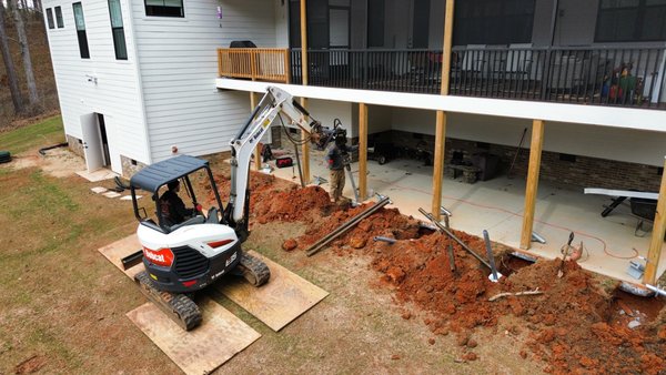 Helical Pier Installation - When the soil beneath a foundation can no longer support the weight of the structure above it, the foundation begins to sink. Helical piles, also called helical piers, are one of the most effective and reliable solutions because they bypass failing soil and transfer the load to stable ground deeper below.
Foundation settlement is serious, but it is also highly fixable when it’s diagnosed correctly and stabilized early. If you’re seeing cracks, sticking doors/windows, sloping floors, or gaps that suggest one part of the home has dropped relative to another, settlement may be the cause.
Signs You May Need Helical Piles:
Drywall Cracks
Doors or windows that stick, won’t latch, or show gaps at the frame
Diagonal cracks from door/window corners (especially on multiple levels)
Floors that slope noticeably toward a wall or in one direction
Gaps between walls and the ceiling or floor
Stair-step cracks in brick/block exterior
A section of the home (or chimney) appearing lower than the rest Helical Pier Installation - When the soil beneath a foundation can no longer support the weight of the structure above it, the foundation begins to sink. Helical piles, also called helical piers, are one of the most effective and reliable solutions because they bypass failing soil and transfer the load to stable ground deeper below.
Foundation settlement is serious, but it is also highly fixable when it’s diagnosed correctly and stabilized early. If you’re seeing cracks, sticking doors/windows, sloping floors, or gaps that suggest one part of the home has dropped relative to another, settlement may be the cause.
Signs You May Need Helical Piles:
Drywall Cracks
Doors or windows that stick, won’t latch, or show gaps at the frame
Diagonal cracks from door/window corners (especially on multiple levels)
Floors that slope noticeably toward a wall or in one direction
Gaps between walls and the ceiling or floor
Stair-step cracks in brick/block exterior
A section of the home (or chimney) appearing lower than the rest
