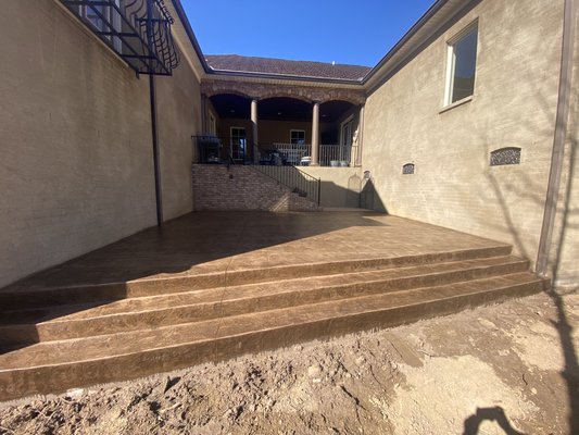 18x36 Bluestone Stamped Patio
Primary color:Santa Fe buff color
Secondary Color:Westwood Brown release - We had been recommended to this client, and they wanted to do something different with the open space they had. They did have a slope in this open space and we were able to install new steps leading to the ground level, leading to a new pool project they have upcoming in the future. 18x36 Bluestone Stamped Patio
Primary color:Santa Fe buff color
Secondary Color:Westwood Brown release - We had been recommended to this client, and they wanted to do something different with the open space they had. They did have a slope in this open space and we were able to install new steps leading to the ground level, leading to a new pool project they have upcoming in the future.