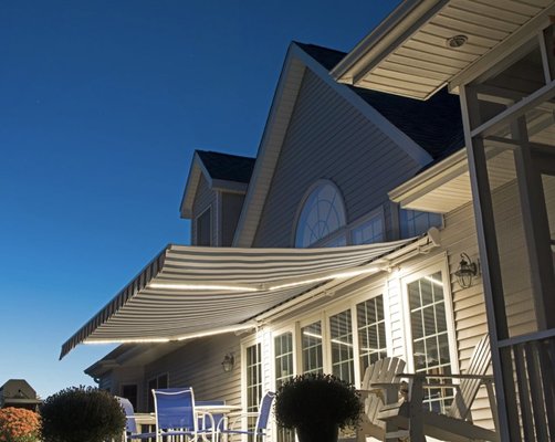 Exterior Shades and Awnings - Our outdoor patio shades and awnings can act as a barrier against pesky insects like mosquitoes and flies. When fully lowered, these custom outdoor shades can help create a more comfortable patio by reducing the light bugs are attracted to and actually forming a physical barrier, allowing you to enjoy your evenings in peace. Many of our exterior shades can give you that "screened-in porch" feeling on demand! Exterior Shades and Awnings - Our outdoor patio shades and awnings can act as a barrier against pesky insects like mosquitoes and flies. When fully lowered, these custom outdoor shades can help create a more comfortable patio by reducing the light bugs are attracted to and actually forming a physical barrier, allowing you to enjoy your evenings in peace. Many of our exterior shades can give you that "screened-in porch" feeling on demand!
