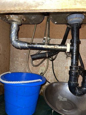 Sink repair￼ - Repaired sink drain and replaced Fossett￼