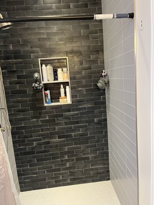 Bathroom in San Francisco - This was a tub in a kids room but they could not really use it so we convert it into a walk-in shower. With permits and the kids designed picked the design the bathroom, we put double niche and added tile. The customer was really happy with the end product.