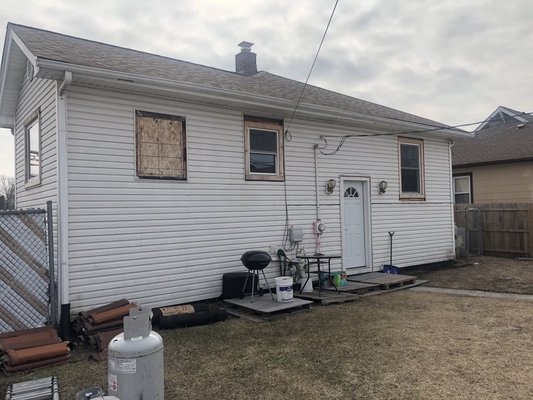 Hammond, Indiana (Vinyl Siding Project) - This home in Hammond, Indiana wanted to update their siding which was fading and correct their leaking windows. Our project manager Joe was assigned the task of making these dreams come true. We proposed replacing the siding, window capping, gutters, fascia, and soffit to make the house look amazing, but more importantly function more efficiently. We installed PLYGEM Camden Pointe vinyl siding on this home and it turned out fantastic. The homeowner was extremely pleased. Hammond, Indiana (Vinyl Siding Project) - This home in Hammond, Indiana wanted to update their siding which was fading and correct their leaking windows. Our project manager Joe was assigned the task of making these dreams come true. We proposed replacing the siding, window capping, gutters, fascia, and soffit to make the house look amazing, but more importantly function more efficiently. We installed PLYGEM Camden Pointe vinyl siding on this home and it turned out fantastic. The homeowner was extremely pleased.