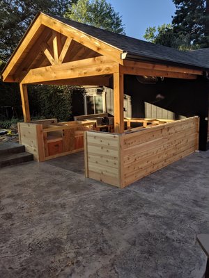 Outdoor Kitchen - This is an outdoor kitchen by Home Makeover. We also poured them a new driveway and stone retaining wall