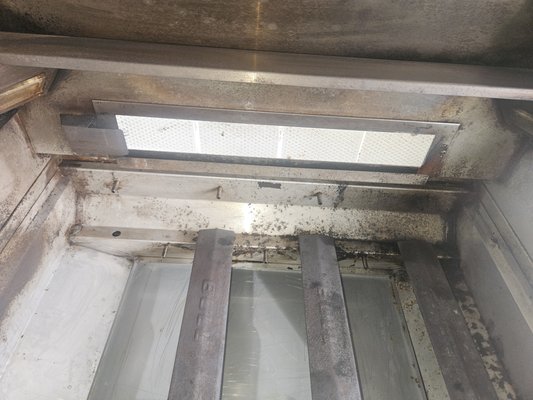 Grill - Years of food and grease build up. Grill - Years of food and grease build up.