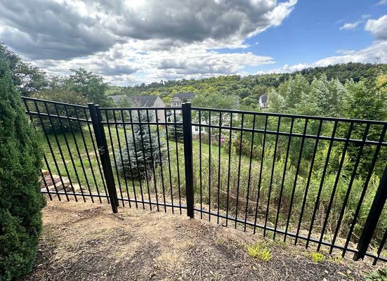 Aluminum Fences - Metal fences are among the most ornamental of fence types. Think Victorian-era properties with their elegant wrought iron fences and beautiful designs. That’s not the only way to build a metal fence for your home though. Metal fences can be built to suit a variety of uses and aesthetics.
