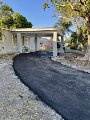 Hot asphalt overlay - Saw cut and removed roots then lay commercial grade hot asphalt overlay Hot asphalt overlay - Saw cut and removed roots then lay commercial grade hot asphalt overlay