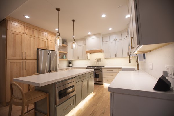 Libertyville Kitchen Remodel - These Libertyville homeowners liked the layout of their kitchen, but it wad dull and dated. Regency was able to bring our client's dream to life. The main cabinets are Regency's White Shaker, with KraftMaid's Escape Gray for the island and Natural Maple for the adjacent pantry. Daltile's Valor White quartz used for the countertops and full backsplash brought the color scheme together, and ABT provided top-tier appliances to complete the space. Libertyville Kitchen Remodel - These Libertyville homeowners liked the layout of their kitchen, but it wad dull and dated. Regency was able to bring our client's dream to life. The main cabinets are Regency's White Shaker, with KraftMaid's Escape Gray for the island and Natural Maple for the adjacent pantry. Daltile's Valor White quartz used for the countertops and full backsplash brought the color scheme together, and ABT provided top-tier appliances to complete the space.