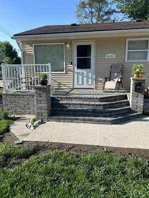 Front Patio - I completed a paver patio project for a client where I transformed their old porch into a stunning new outdoor space. The patio features a modern design with durable and aesthetically pleasing pavers, providing a perfect spot for relaxation and entertainment. It seamlessly blends with the surrounding landscape, enhancing the overall appeal of their home.