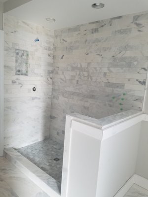 BATHROOM REMODELING PROJECTS - Revamp your bathroom with our full-service remodeling solutions! We offer expert installation of shower glass enclosures, custom-built niches, and complete flooring solutions. Our team also excels in wall tiling and stone work, as well as designing and installing stylish vanities. From concept to completion, we bring your dream bathroom to life with impeccable craftsmanship and attention to detail. BATHROOM REMODELING PROJECTS - Revamp your bathroom with our full-service remodeling solutions! We offer expert installation of shower glass enclosures, custom-built niches, and complete flooring solutions. Our team also excels in wall tiling and stone work, as well as designing and installing stylish vanities. From concept to completion, we bring your dream bathroom to life with impeccable craftsmanship and attention to detail.