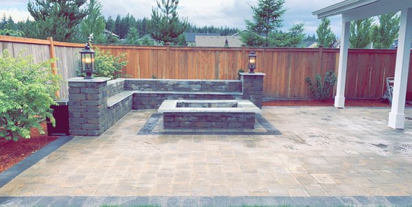 Patio cover and pavers patio with free standing wall as bench - We have done 20‘ x 50‘ pavers patio with Belgard pavers and we did freestanding walls as bench with pillars caps on solar lights we also did patio cover off 12 x 40‘ wood finishing look ceiling and outdoor fans ‘ and shingles Roofing with Stylite