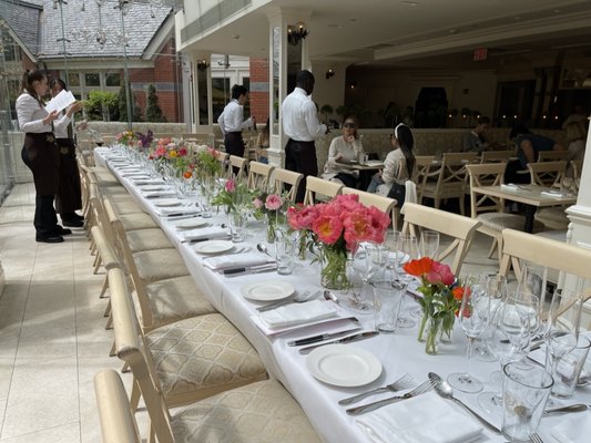 Long table decor - Large arrangement (in a vase) of luxury flowers in pastel colors - peonies, ammi, garden roses, clematis, ranunculus and other season varieties with a bottle of Rose Veuve Cliquot in a wooden gift box. Long table decor - Large arrangement (in a vase) of luxury flowers in pastel colors - peonies, ammi, garden roses, clematis, ranunculus and other season varieties with a bottle of Rose Veuve Cliquot in a wooden gift box.