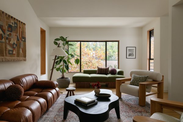 La Loma Rd - Pasadena, CA - Project Scope: Full-Home Furnishings / Art / Rugs / Styling / Plants
Situated atop San Rafael Hills, this contemporary home was recently gut renovated and restored with pristine finishes and smart technology throughout. An Inc. 5000 entrepreneur in the marketing industry, this client gave us a completely blank canvas and free rein to design & furnish their space to better suit their free-spirited lifestyle.
With large open concept schematics, it’s important to section out each zone with a clear understanding of its design ethos and intended function. Each area, though separate, needs to have a confluence of artistic language so that the entire home feels connected and balanced. For this project, we had the luxury to really be creative with every aspect of the interiors — from the material used, to the whimsical style of the furnishings, to custom finishes like wallpaper, paint, and lighting. It was truly a love story to our craft, and we used this opportunity to source pieces from different eras, and rare objects that are one-of-a-kind from collectors around the world. For the main staples, the living room features a Mario Bellini sofa reupholstered in a cognac leather, organic oak coffee table, and the iconic Hans Wegner Flag Halyard chair in the family lounge. Implemented altogether, the result is a space that feels playful, energetic, and highly curated. La Loma Rd - Pasadena, CA - Project Scope: Full-Home Furnishings / Art / Rugs / Styling / Plants
Situated atop San Rafael Hills, this contemporary home was recently gut renovated and restored with pristine finishes and smart technology throughout. An Inc. 5000 entrepreneur in the marketing industry, this client gave us a completely blank canvas and free rein to design & furnish their space to better suit their free-spirited lifestyle.
With large open concept schematics, it’s important to section out each zone with a clear understanding of its design ethos and intended function. Each area, though separate, needs to have a confluence of artistic language so that the entire home feels connected and balanced. For this project, we had the luxury to really be creative with every aspect of the interiors — from the material used, to the whimsical style of the furnishings, to custom finishes like wallpaper, paint, and lighting. It was truly a love story to our craft, and we used this opportunity to source pieces from different eras, and rare objects that are one-of-a-kind from collectors around the world. For the main staples, the living room features a Mario Bellini sofa reupholstered in a cognac leather, organic oak coffee table, and the iconic Hans Wegner Flag Halyard chair in the family lounge. Implemented altogether, the result is a space that feels playful, energetic, and highly curated.