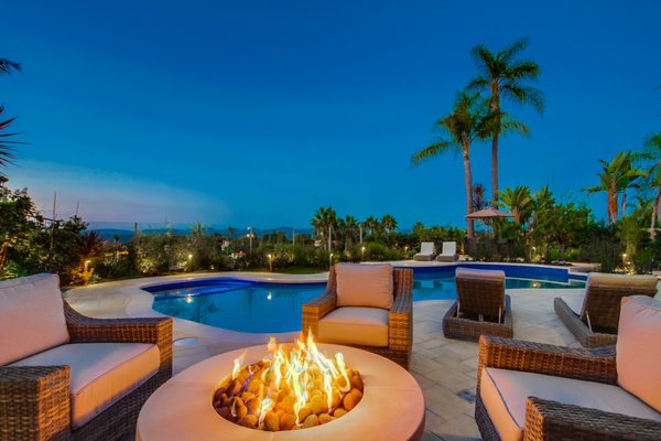 Backyard Landscape Design and Installation Featuring Outdoor Kitchen & BBQ - This backyard got a full upgrade with a custom fire pit, outdoor kitchen with BBQ island, pool deck pavers, and outdoor lighting. Our team handled everything from landscape design to installation, completed in Del Mar, CA. Backyard Landscape Design and Installation Featuring Outdoor Kitchen & BBQ - This backyard got a full upgrade with a custom fire pit, outdoor kitchen with BBQ island, pool deck pavers, and outdoor lighting. Our team handled everything from landscape design to installation, completed in Del Mar, CA.