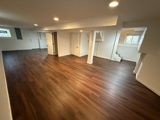 Basement Subfloor Repair, New Flooring & Painting in Edgewater - Water damaged & unlevel subfloor repair & new flooring installation in the Rental Property.