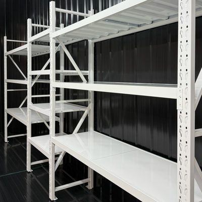 Easy Customized Garage Setup - This garage setup shows how incredibly customizable Budget Shelves are. In addition, you can see the unmatched peace of mind and sense of organization that comes from the beautiful smooth white finish.