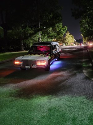 Meet our Hearse - Her name is "Hellin Back" - Sometimes we come across something so cool and creepy that we have to have it!  Behold, our 1988 Cadillac Funeral Coach.  She just got light on her undercarriage and is looking pretty cool!