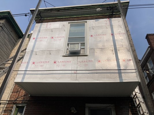 Siding renovation - We removed all siding and install new insulation and vinyl siding capped all the fascia and window. Install new Sofit.  Siding renovation - We removed all siding and install new insulation and vinyl siding capped all the fascia and window. Install new Sofit. 