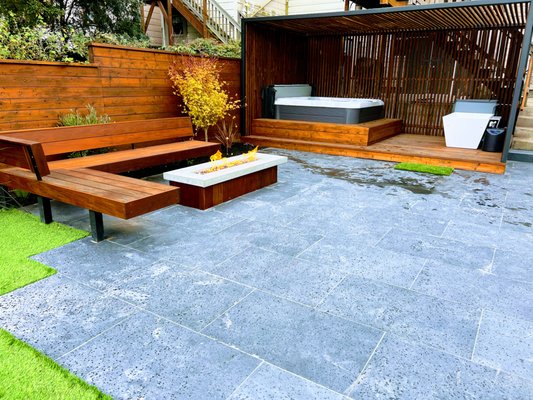 Backyard Spa - We took a blank, worn out yard and transformed it into a private spa oasis - featuring a hot tub and cold plunge surrounded by a privacy screen, a cozy fire pit seating area with built-in bench, flagstone patio, turf area, and new fencing. Redwood used throughout and the drought-friendly planting keeps it feeling warm and organic. Backyard Spa - We took a blank, worn out yard and transformed it into a private spa oasis - featuring a hot tub and cold plunge surrounded by a privacy screen, a cozy fire pit seating area with built-in bench, flagstone patio, turf area, and new fencing. Redwood used throughout and the drought-friendly planting keeps it feeling warm and organic.