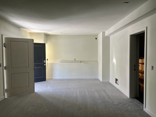 Basement Remodel Edgewood 2023 - We converted this tool shop into a small apartment. We did drywall, texture, molding and carpeting. This new apartment is ready to move in.