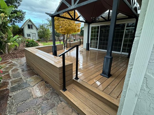 Deck Remodel - This remodel was completed in about a week. High benches were added to act as a railing but also provide additional seating. The metal railing are minimal but are the perfect combo with the deck and patio cover. Multiple areas to get onto the deck is a big plus. Deck Remodel - This remodel was completed in about a week. High benches were added to act as a railing but also provide additional seating. The metal railing are minimal but are the perfect combo with the deck and patio cover. Multiple areas to get onto the deck is a big plus.