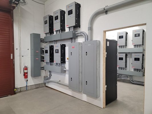 Large Residential Solar & Storage - We designed the system with room for expansion, both on the solar side and the battery side. And, we specifically chose equipment that afforded us that flexibility. Each system can support 250A passthrough partially backing up the dual 400A services on site.

The batteries were installed in an outbuilding barn with a five-inch thick commercial concrete floor. The ability to stack the batteries allowed us to fit several enclosures in one room, which was a rather tall room. The room itself was actually rather tight, with no airflow, so we had to add a mini split to make sure the room stayed cool.

With his solar-plus-storage system in place, this Michigan homeowner can take advantage of the many benefits of renewable energy all while lowering the monthly electricity bill and reducing dependence on the utility grid.