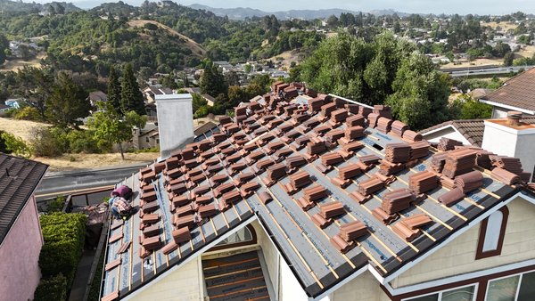 New tile roof installation - This project was based on removing the old tiles to install a new plywood, double underlayment and new concrete tiles. New tile roof installation - This project was based on removing the old tiles to install a new plywood, double underlayment and new concrete tiles.