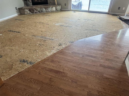 Hardwood Installation and Refinishing - This red oak prefinished floor in Kenockee, MI went from having carpet to new hardwood flooring throughout the entire first floor. Hardwood Installation and Refinishing - This red oak prefinished floor in Kenockee, MI went from having carpet to new hardwood flooring throughout the entire first floor.