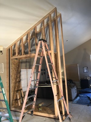 Building a elevated wall - This wall was removed by the previous owner, the new homeowner wanted the original wall back after seeing his neighbors homes.