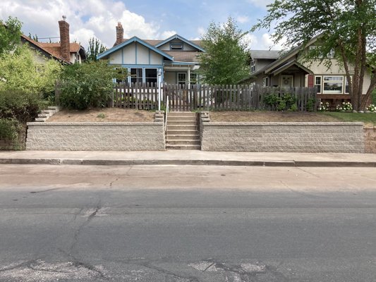 New Retaining Wall - This job was a complete removal of an existing retaining wall that was cracked and falling apart. We installed a beautiful rendition of an updated solid retaining wall built to last.