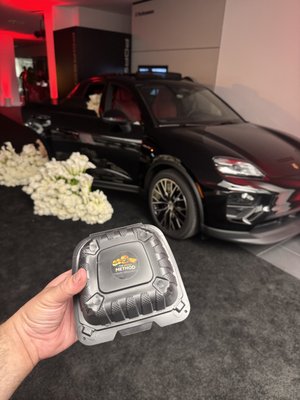 Dealership Catering - We had the opportunity to cater the grand opening of Porsche’s new DTLA location, delivering a high-energy culinary experience for a crowd of over 1,000 guests. As the night unfolded, we stepped in to provide a late-night snack that matched the excitement of the event—freshly made smash burgers, served hot off the grill.
Our team operated at full speed, ensuring every guest received a perfectly crafted burger with quality ingredients and bold flavor. The interactive cooking setup added to the atmosphere, drawing guests in and creating a memorable food experience that complemented the sleek, modern vibe of the event.
From logistics to execution, this large-scale catering project showcased our ability to handle high-volume service without compromising on quality, making it a standout moment in an unforgettable grand opening celebration.