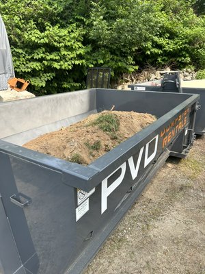 Heavy Debris/ Concrete Removal - Recently, a customer in Newport, Rhode Island, needed to remove a section of his concrete driveway to make repairs to an underground drain. We were able to promptly deliver a 10-yard dumpster to his location, allowing him to safely dispose of the broken concrete. Once the dumpster was filled, we efficiently hauled it away to the appropriate recycling facility, ensuring environmentally responsible disposal. At PVD Dumpster Rentals, we’re here to support your projects with reliable service and practical solutions!