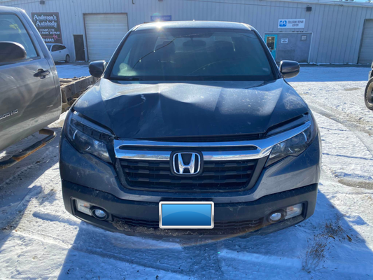 Collision & Clear Bra Repairs for Christmas - This grey 2017 Honda Ridgeline RTL slid off the road in November during some of the harshest winter conditions in North Idaho history.  Our mission was to get it back on the road before Christmas! And that we did. The Honda Ridgeline's front hood, fenders, and doors required repainting and reapplication of 3M Scotchgard clear coat technology (now provided here at Anderson's in Ponderay, Idaho. This was a complex project including internal repairs to the air conditioner, radiator, headlights, sensors, connectors, and more. On big jobs like this, our team sends "in progress" repair photos in email and text updates to keep customers in the loop - in the case, of a 3-week repair from start to finish. We move quickly because major parts are ordered and delivered before we schedule repairs. 

But what matters is what our customers think. From Google 5-Star Reviews:

"Our truck was repaired at Anderson's after sliding off the road. There was a lot of bodywork that needed to be done. Anderson's sent us photo updates as they worked. The truck looks brand new!"