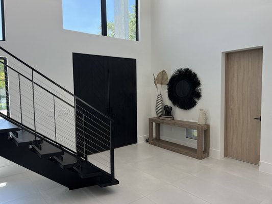 New Construction - Luxury Home in St Pete. - It was a very exciting project as we were working with one of our favorite designers in Tampa bay area. She designed and picked all the Interior pieces, that is the main reason why this house looks really welcoming and modern. The entry door is installed flush with the wall and there is no casing around it. New Construction - Luxury Home in St Pete. - It was a very exciting project as we were working with one of our favorite designers in Tampa bay area. She designed and picked all the Interior pieces, that is the main reason why this house looks really welcoming and modern. The entry door is installed flush with the wall and there is no casing around it.
