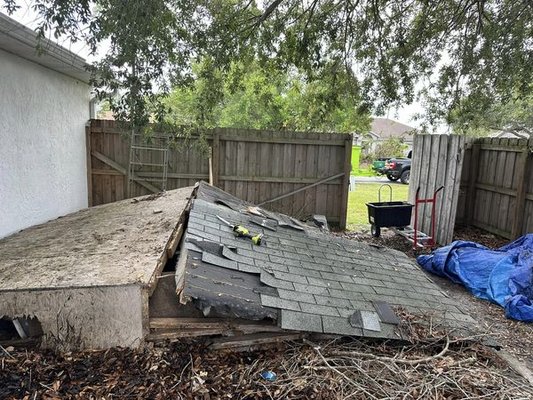 Shed Collapse from Hurricane - This shed fell down during a recent hurricane and we removed it in under 2 and a half hours. The homeowner wanted to use this space for future needs in the backyard and was ready to get rid of it. It was an easy project for a great price. Happy to help out our neighbors. Shed Collapse from Hurricane - This shed fell down during a recent hurricane and we removed it in under 2 and a half hours. The homeowner wanted to use this space for future needs in the backyard and was ready to get rid of it. It was an easy project for a great price. Happy to help out our neighbors.