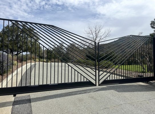 Custom Automatic Swing Gate Installation - For this project, we designed and installed a high-security automatic gate tailored to the property’s aesthetic. We integrated a heavy-duty motor and a smart access control system for seamless entry. The result is a durable, stylish, and fully automated solution that provides both security and convenience. Custom Automatic Swing Gate Installation - For this project, we designed and installed a high-security automatic gate tailored to the property’s aesthetic. We integrated a heavy-duty motor and a smart access control system for seamless entry. The result is a durable, stylish, and fully automated solution that provides both security and convenience.