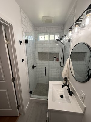 Bathroom build out - We were asked to come up with a way to add a bathroom in this home without adding square footage, challenge accepted. We took an unused closet and built out functional bathroom for our customer.