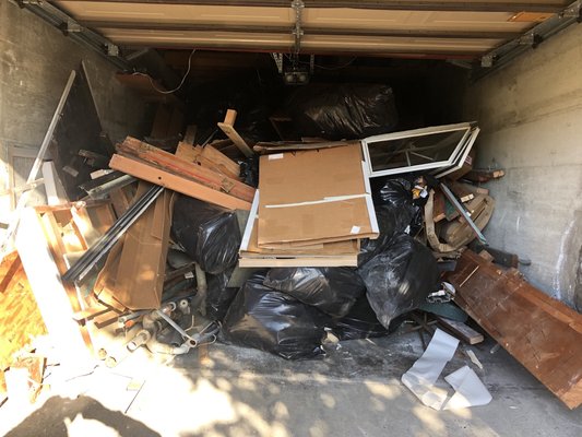Garage Clear-Out - This Mill Valley garage was filled to the brim with construction debris. One call to The Alliance and POOF! It’s gone!