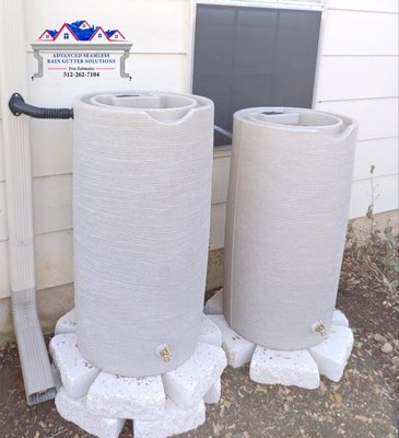 Rain Barrels - A Rain Barrel is a simple rain water collector that is connected to the downspouts of your homes rain guttering system, connecting to the downspout with a rain diverter or fitting under a modified downspout. A spigot or hose connector lets you drain the water for use around your landscape. Rainwater harvesting provides an alternative to using municipal water or well water for irrigation. Plants benefit from water that's free of the chemicals and minerals in tap water.  Rain barrels can reduce the volume of runoff entering the storm sewer, keeping pesticides, fertilizer and other chemicals out of nearby bodies of water.